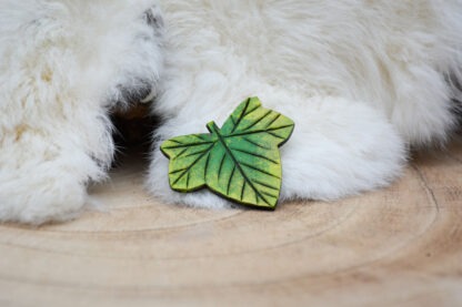 Leren speld groen klimopblad